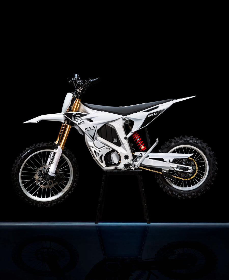 Altis Delta electric pit bike, White — side profile in a dark studio