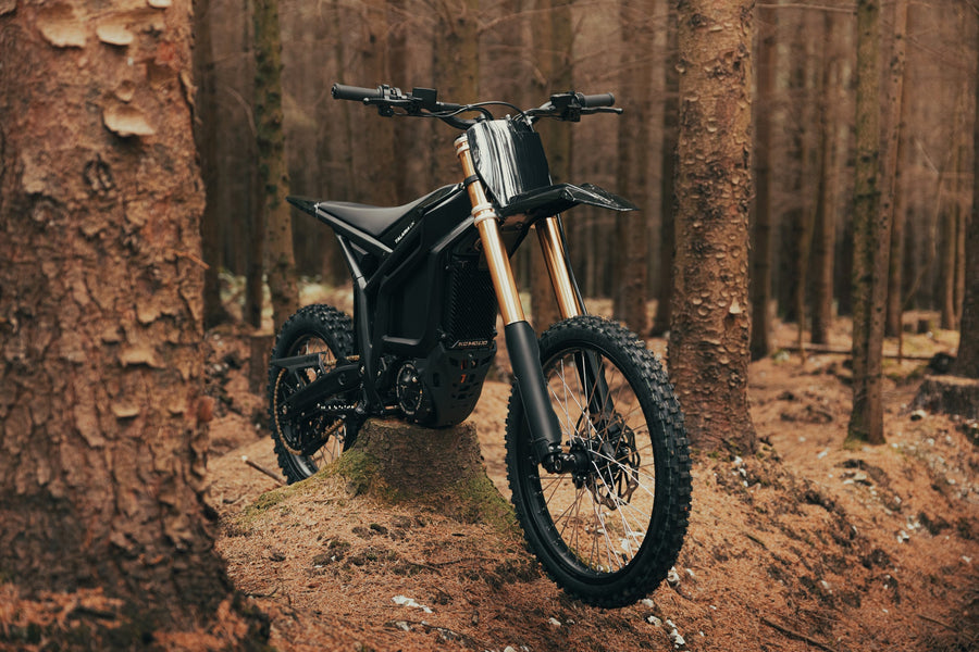 Talaria Komodo in the forest — front three-quarter view