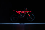 Altis Sigma MX 2026 electric dirt bike, Red, 19"/16" MX wheels — side profile