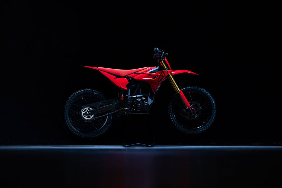 Altis Sigma 2026 electric dirt bike, Red, 19"/19" trail wheels — side profile