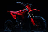 Altis Sigma 2026, Red — front three-quarter view in a dark studio