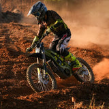 Rider in action on a Green Sur-Ron Light Bee X