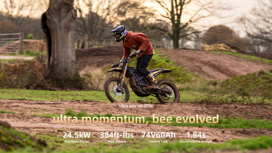 Sur-Ron Ultra Bee HP 2026 in action on a forest trail — official graphic with 24.5 kW, 384 ft-lb and 74V 60Ah